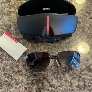 Prada Sport
PRADA SPORT LINEA ROSSA SPS56M gunmetal/brown